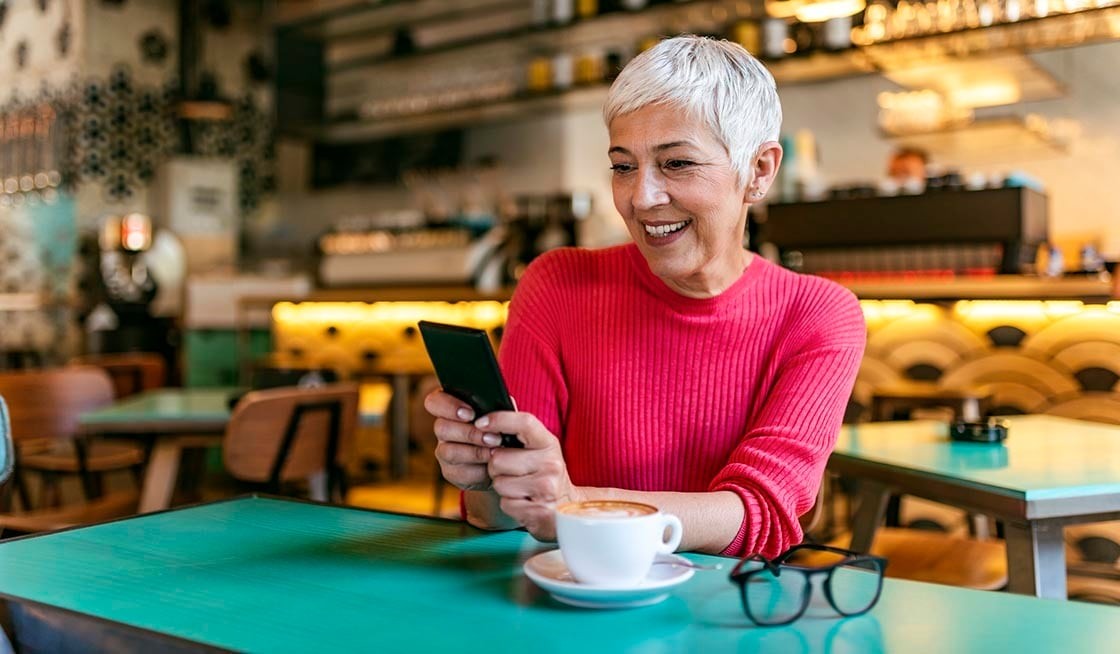 Lady with a Phone and a Coffee