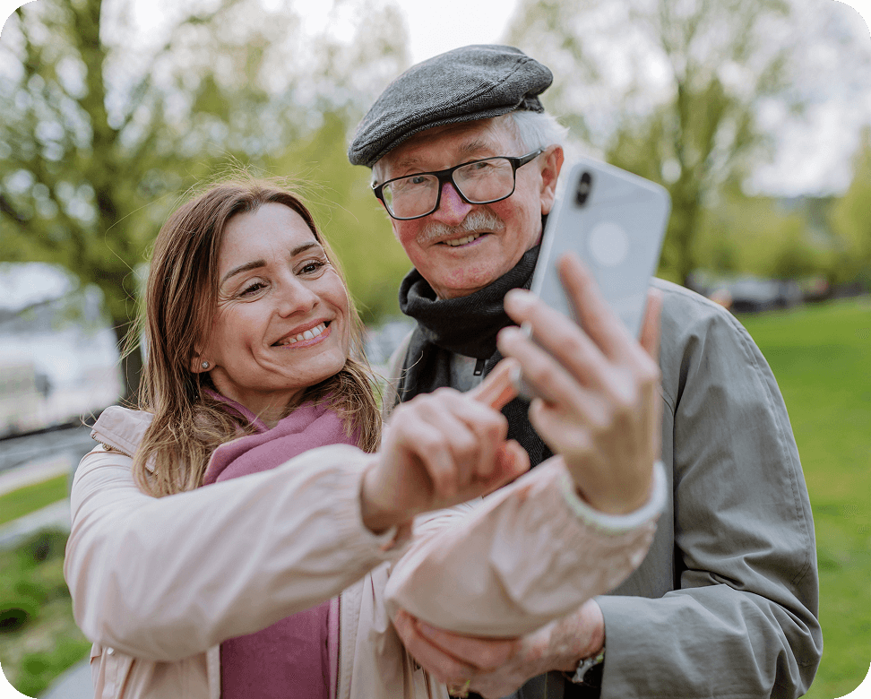 Older Couple Looking at Phone